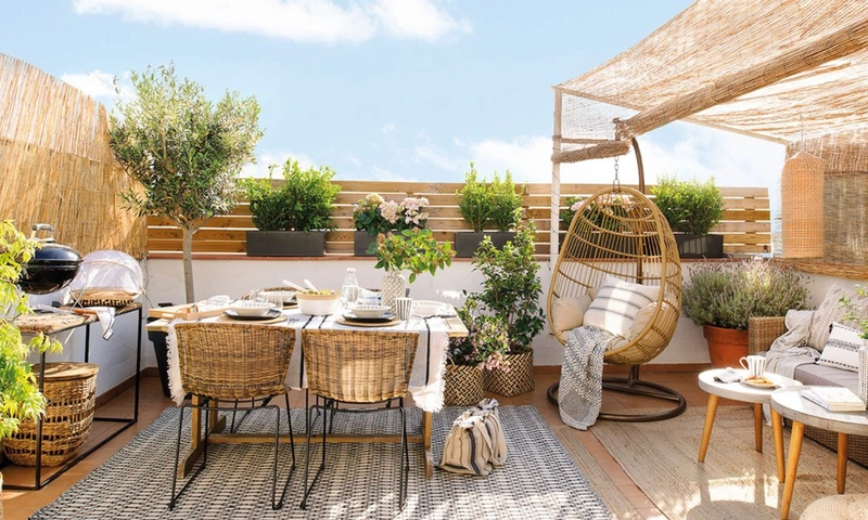 Beautifully decorated small terrace for relaxation and barbecue